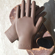 A pair of NAVVE silicone Glaze Gloves displayed